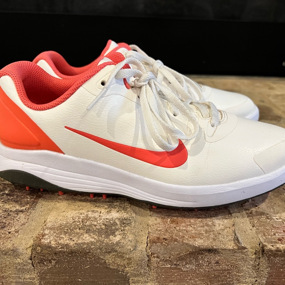 Like new, worn once Nike Golf shoes, women’s size 9/men’s 7.  Cream and coral